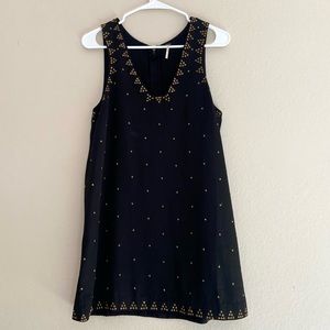 Free People black shift dress with adorable gold heart detail